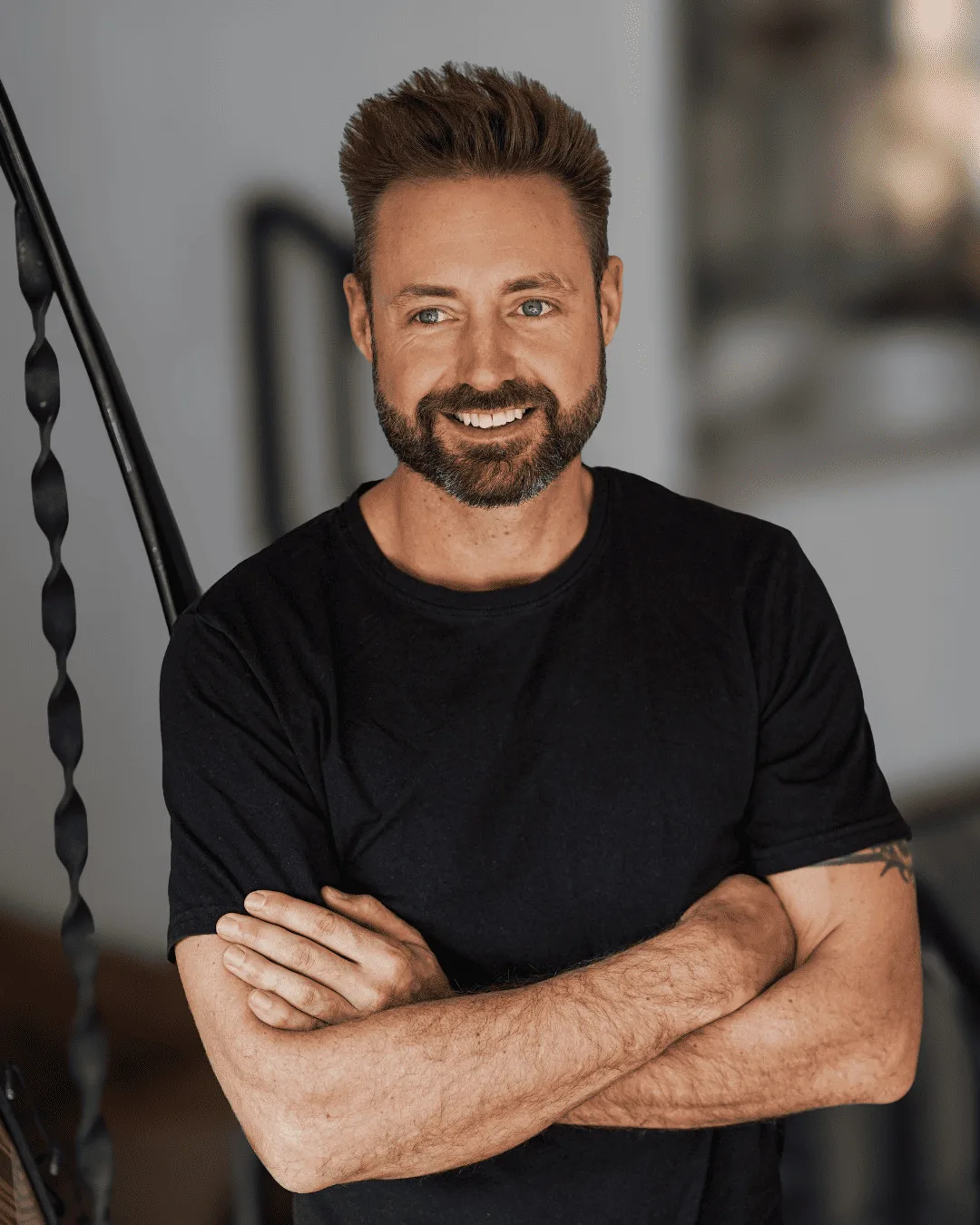 Ryan EA 10801350 Ryan Wheeler, Business English coach for executives, smiling confidently with arms crossed, ready to help leaders speak English with authority.